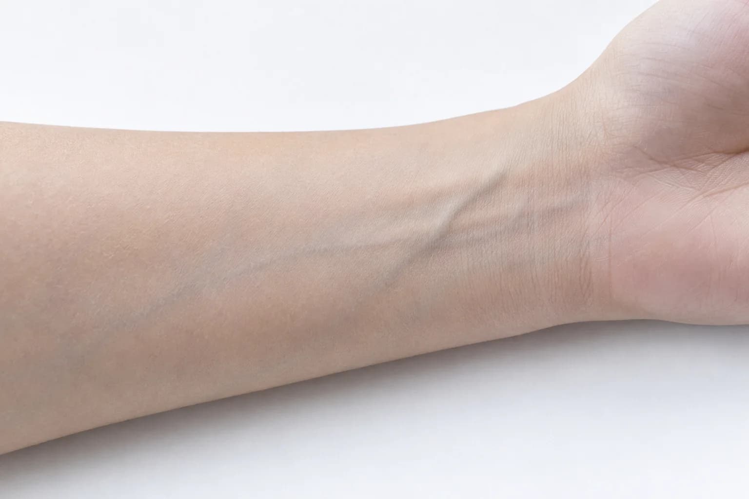 Vein test for skin undertone on inner wrist